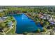 Beautiful aerial view of lakeside townhomes nestled among lush trees and landscaping at 158 Water Oak Dr, Pineville, NC 28134