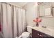 Bathroom featuring a shower with curtain, vanity and mirror at 1807 Oakdale Green Dr, Charlotte, NC 28216