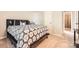 Serene bedroom featuring a queen-sized bed, neutral decor, and access to an ensuite bathroom at 1807 Oakdale Green Dr, Charlotte, NC 28216