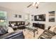 Spacious living room with a large flat-screen TV, comfortable seating, and lots of natural light at 1807 Oakdale Green Dr, Charlotte, NC 28216