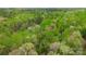 A scenic aerial view of the property surrounded by lush trees at 181 Canipe Rd, Dallas, NC 28034