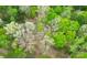 Aerial view showcasing lush greenery and a tree canopy at 181 Canipe Rd, Dallas, NC 28034