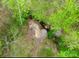 Unique aerial perspective highlighting a stream at 181 Canipe Rd, Dallas, NC 28034