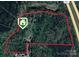 Expansive aerial view of wooded property; borders highway with potential development opportunities at 181 Canipe Rd, Dallas, NC 28034