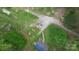 An aerial view shows this home's spacious yard and long private driveway at 181 Canipe Rd, Dallas, NC 28034