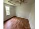 Cozy bedroom with wood-look floors, natural light and neutral wall color at 181 Canipe Rd, Dallas, NC 28034