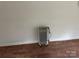 A room shows hardwood floor and white wall with heater at 181 Canipe Rd, Dallas, NC 28034