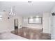 Finished basement with a projector, screen, and theater-style design at 1811 Robbins Meadows Dr, Waxhaw, NC 28173