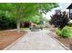 Inviting backyard featuring a cozy firepit area with seating, perfect for outdoor gatherings and relaxation at 1811 Robbins Meadows Dr, Waxhaw, NC 28173