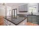 Granite countertops and stainless steel appliances make this kitchen a chef's dream at 1811 Robbins Meadows Dr, Waxhaw, NC 28173