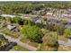 Aerial view of the neighborhood showcasing homes, commercial areas, and the surrounding landscape at 1860 Rosemont St, Salisbury, NC 28144