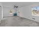 Spacious bedroom with carpet, ceiling fan, and natural light at 1860 Rosemont St, Salisbury, NC 28144