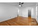Bright bedroom with hardwood floors, ceiling fan, and closet at 1860 Rosemont St, Salisbury, NC 28144