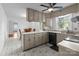 Kitchen featuring neutral cabinets, a breakfast bar, and an adjacent dining area for casual meals at 1860 Rosemont St, Salisbury, NC 28144
