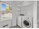 Convenient laundry room with washer, dryer, and a window at 1860 Rosemont St, Salisbury, NC 28144