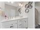 Bright bathroom with double vanity, large mirror, and modern decor at 1870 Beth Haven Church Rd, Denver, NC 28037
