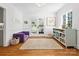 Bright bonus room featuring hardwood floors, ample natural light, and versatile space at 1927 S Wendover Rd, Charlotte, NC 28211