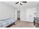 Clean bedroom featuring neutral colors, carpet flooring, and double door closet at 1930 Southridge Dr, Belmont, NC 28012