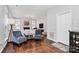 Spacious living room with neutral colors, hardwood floors, and a fireplace at 1930 Southridge Dr, Belmont, NC 28012