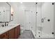 Modern bathroom featuring a glass shower, subway tile, and stylish vanity with matte black fixtures at 1976 Ferncliff Rd, Charlotte, NC 28211