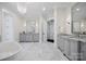 Bright main bathroom with dual vanities, marble countertops, and stylish lighting at 1976 Ferncliff Rd, Charlotte, NC 28211