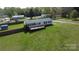 Expansive aerial view of the home featuring a large yard, deck, fencing and additional outbuildings at 2055 Cauble Rd, Salisbury, NC 28144