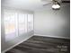 Bedroom with ample natural light and wood-look flooring at 2055 Cauble Rd, Salisbury, NC 28144