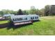Charming single-story home with a cozy front porch and well-maintained lawn at 2055 Cauble Rd, Salisbury, NC 28144