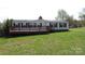 Charming single-story home with a spacious front yard and welcoming covered porch at 2055 Cauble Rd, Salisbury, NC 28144