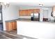 Bright kitchen boasts stainless steel appliances, light wood cabinets and a breakfast bar area at 2055 Cauble Rd, Salisbury, NC 28144