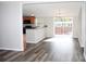 Open-concept kitchen and dining area with sliding door access to the outdoor deck at 2055 Cauble Rd, Salisbury, NC 28144