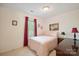 Comfortable bedroom with soft carpeting, a double bed and a sunlit window at 210 35Th Ne Ave, Hickory, NC 28601