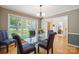 Dining room with hardwood floors, ample natural light, and seating for six at 210 35Th Ne Ave, Hickory, NC 28601