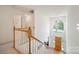 Foyer with staircase leading to upper level; view of front door and window at 210 35Th Ne Ave, Hickory, NC 28601