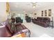 Spacious living room with comfortable leather seating and large windows, perfect for relaxation and entertaining at 210 35Th Ne Ave, Hickory, NC 28601