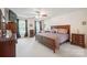 Spacious primary bedroom with ample natural light and dark wood furniture set at 210 35Th Ne Ave, Hickory, NC 28601