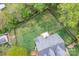 Aerial view of the backyard with a wooded area on a creek at 2104 Planters Knoll Dr, Monroe, NC 28110