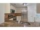 Well-equipped kitchen with stainless steel appliances, granite counters, and stylish backsplash at 2104 Planters Knoll Dr, Monroe, NC 28110