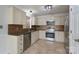 Well-appointed kitchen featuring granite countertops, stainless steel appliances, and neutral cabinetry at 2104 Planters Knoll Dr, Monroe, NC 28110