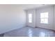 Bright bedroom with double windows and carpet floors, ready for your personal touch and decor at 2124 Barrowcliffe Nw Dr, Concord, NC 28027