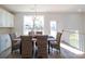 Bright dining room features a table with seating and a large window for plenty of natural light at 2124 Barrowcliffe Nw Dr, Concord, NC 28027