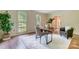 Stylish office space featuring hardwood floors, large windows, and natural light at 2221 Hamilton Mill Rd, Charlotte, NC 28270