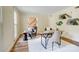 Comfortable office space with hardwood floors, windows, two chairs, and a desk at 2221 Hamilton Mill Rd, Charlotte, NC 28270