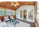 Relaxing sunroom with ample seating and a view to the outdoors at 2221 Hamilton Mill Rd, Charlotte, NC 28270