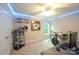 This bedroom is decorated with a drum set and fun LED lighting at 260 Ingonish Dr, Gastonia, NC 28056