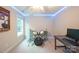 A clean and well lit bedroom featuring a drum set and neutral carpet at 260 Ingonish Dr, Gastonia, NC 28056