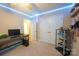View of the bedroom with a computer desk, LED lighting, and trophies at 260 Ingonish Dr, Gastonia, NC 28056