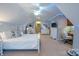 Spacious bedroom with vaulted ceiling, carpet, accent lighting, and white furniture at 260 Ingonish Dr, Gastonia, NC 28056