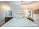 Charming bedroom with a ceiling fan, a decorative sign, and lots of natural light at 260 Ingonish Dr, Gastonia, NC 28056