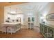 Modern kitchen and breakfast nook with white cabinets and stainless steel appliances at 260 Ingonish Dr, Gastonia, NC 28056